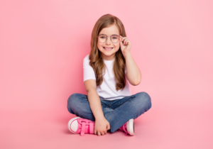 A child wearing glasses