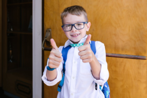 A child giving a thumbs up